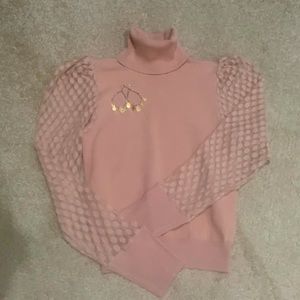 Boutique Turtleneck Sweater-Mauve with Shear Puffed Sleeves & Banded Waist.